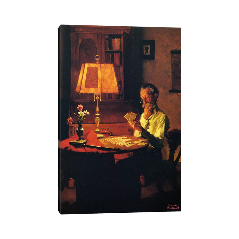Man Playing Cards By Lamplight by Norman Rockwell - Wrapped Canvas Print