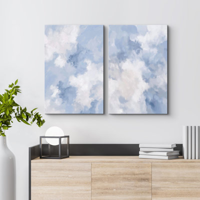 Coups de peinture abstraits, bleu clair et modernes, encadrés dans le salon