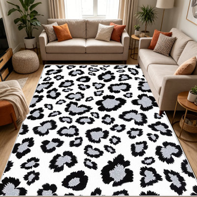 Tapis léopard noir et blanc de 1 pièce, élégant tapis décoratif polyvalent, facile à nettoyer et à entretenir, meuble idéal pour la chambre à coucher, le salon, le couloir, le vestibule, le dortoir et le bureau afin de rafraîchir l'ambiance intérieure de votre maison