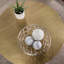 Table basse ronde avec plateau en relief