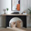 Console moderne minimaliste avec base et plateau arqués, parfaite pour une décoration polyvalente