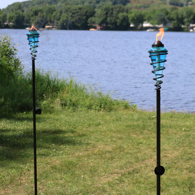 Ensemble de 4 torches de jardin en verre à tourbillon avec hauteur réglable Schofields