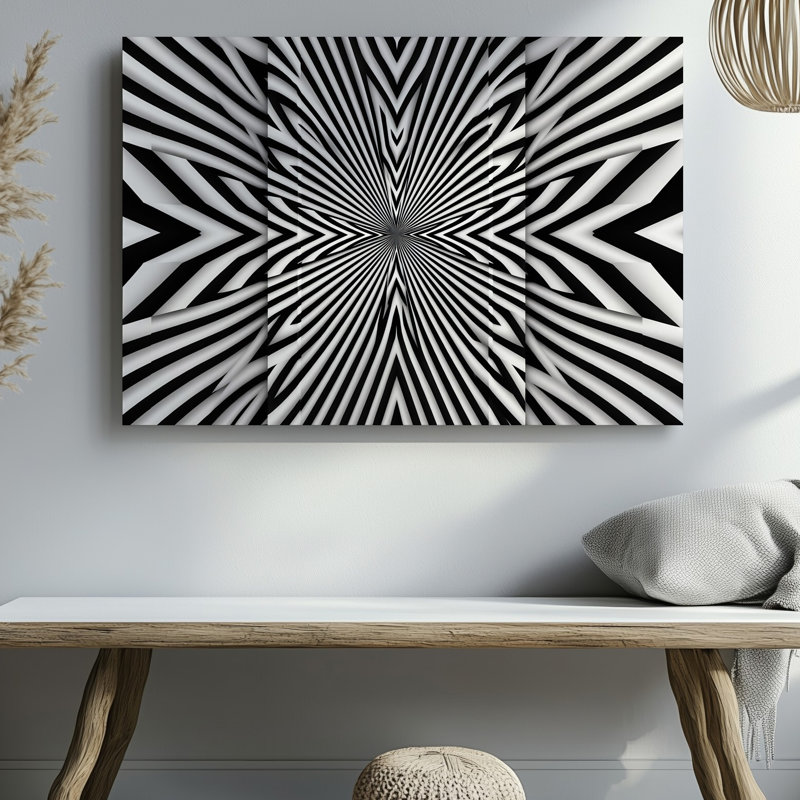 La toile crée une conception abstraite visuellement saisissante avec un motif symétrique d'étoiles murales composé d'une toile murale en noir et blanc