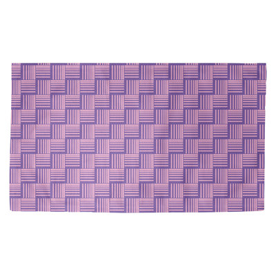 Tapis décoratif mauves à rayures tressées