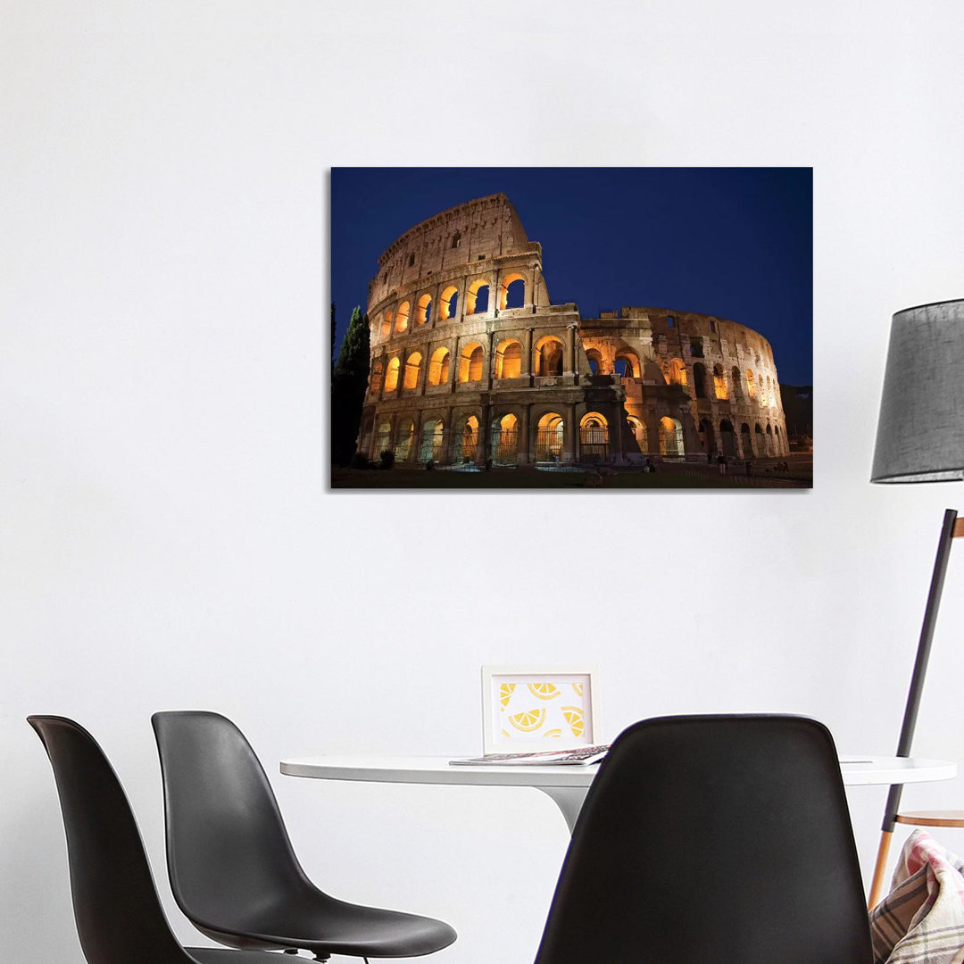 Italy, Rome, Colosseum. Night Scene At Landmark. by Jaynes Gallery - Wrapped Canvas Print