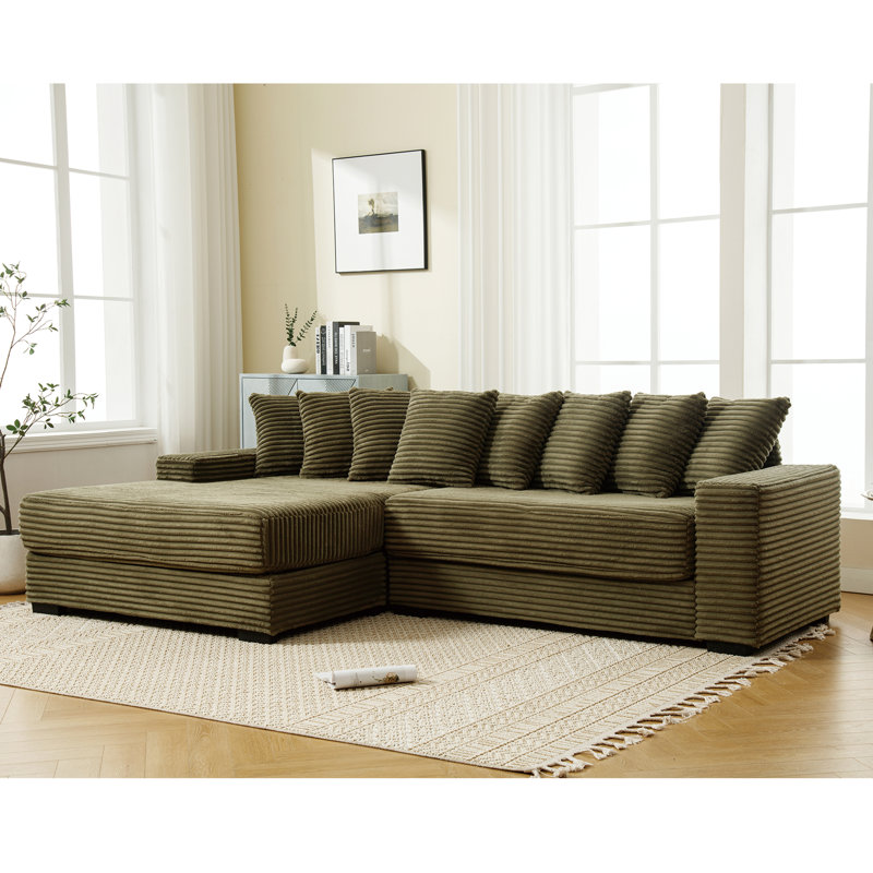 Très grand canapé en forme de L en deux pièces avec méridienne gauche, accoudoirs et huit coussins décoratifs pour un assemblage facile et une détente