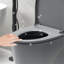 Une toilette avec double chasse d'eau 001. Siège à fermeture en douceur 1,1 / 1,6. Eau, bol allongé. Hauteur, en céramique grise Chasse, hauteur. Pour la catégorisation