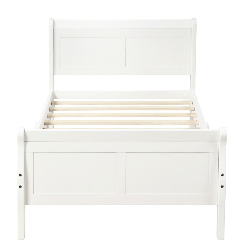 Lit simple en bois massif avec tête de lit et plateforme blanche