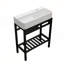 Lavabo console en céramique d'inspiration rétro avec planche à laver intégrée et pieds noirs élégants, idéal pour les petites salles de bain et l'entretien facile