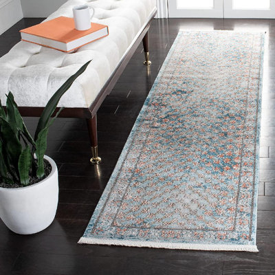 Tapis oriental bleu / rose Quinter
