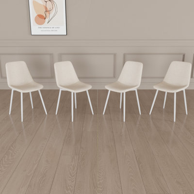 Un ensemble de 4 chaises de salle à manger, une chaise de cuisine moderne, des chaises rembourrées en lin et des chaises de salle à manger robustes décorées de pieds en métal. Chaise en tissu