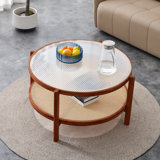 table basse circulaire à double couche, plateau en verre artisanal, rotin PE, structure en bois massif.