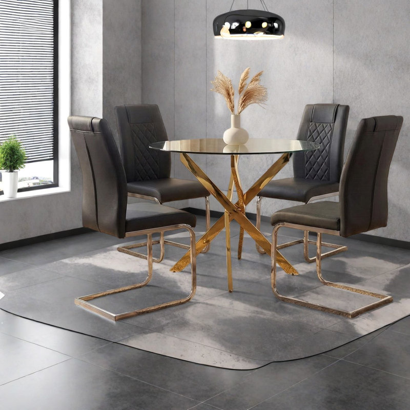 Ensemble de table de salle à manger moderne en verre avec pieds dorés, parfait pour les cuisines d'intérieur