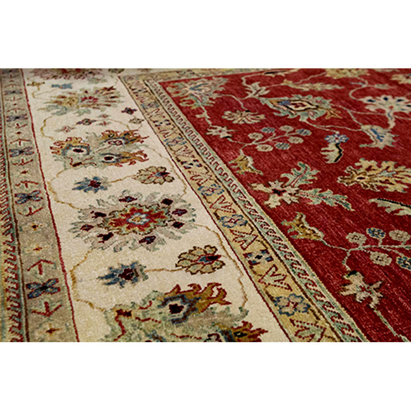Tapis rouge et ivoire noué à la main de haute qualité