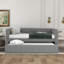 Lit de jour simple avec couchette, base de coussin rembourrée grise, fabrication solide avec dossier rembourré stable