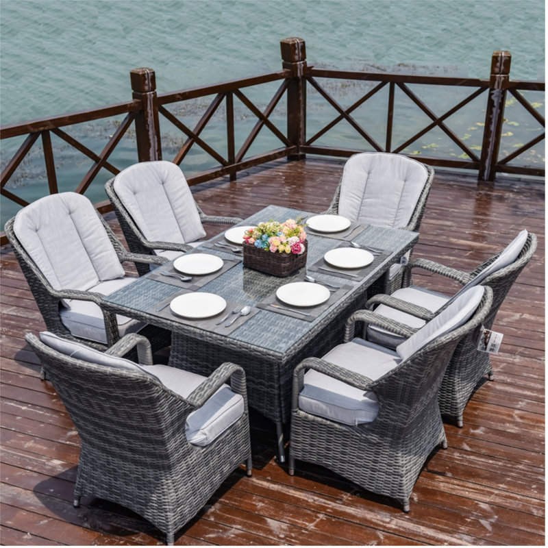Taziya 6 - Person Patio Dining Set with Rectangular Table , Cushions Included