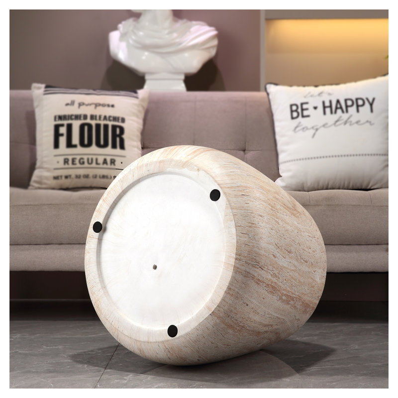 Table basse d'appoint ronde en forme de tambour, finition beige/jaune, en imitation travertin MgO, pour une utilisation intérieure et extérieure couverte.