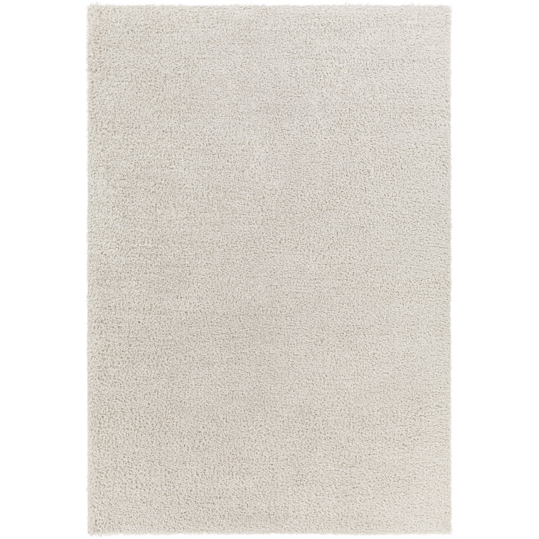 Tapis uni à poils longs
