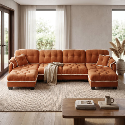 Canapé nuage orange 4 places en chenille avec 2 poufs amovibles, coussins capitonnés et finitions à pompons