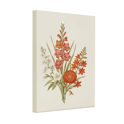 Arrangement floral de plantes et de fleurs avec des fleurs orange et blanches