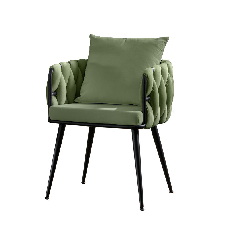 Fauteuil capitonné de couleur olive