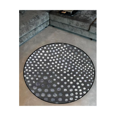 Tapis rond rond gris foncé à pois