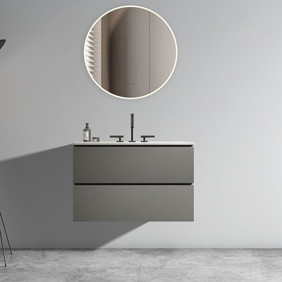 Meuble-lavabo mural avec lavabo en céramique et trois trous de robinet