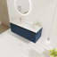 Meuble-lavabo flottant avec lavabo en résine en forme de goutte