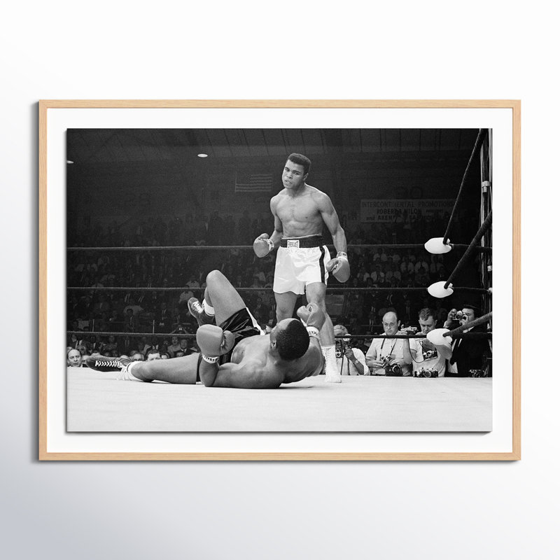 Boxers Muhammad Ali And Sonny Liston Fighting by Getty Images, 36" H x 48" W, White Oak Framed