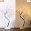 108 arbres et branches éclairés