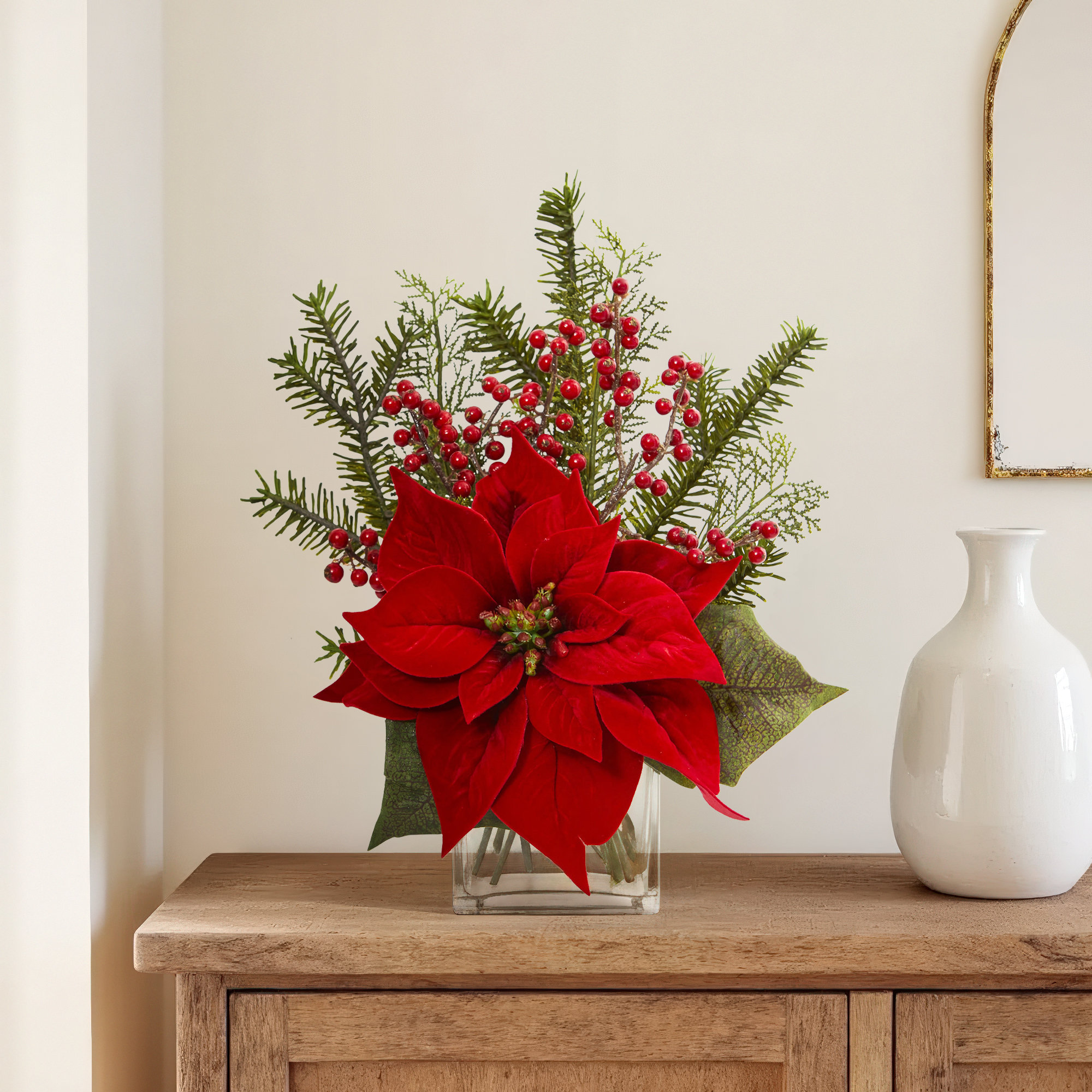 Poinsettia Pine and Berries Mixed Floral Arrangement in Vase