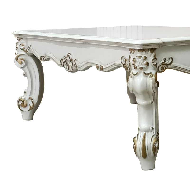 Table basse rectangulaire avec perle antique et décorative - ajoute de la grâce à l'espace classique avec volutes élégantes