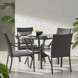 Tahirul 4 - Person Metal Patio Dining Set with Round Table , Cushions Included