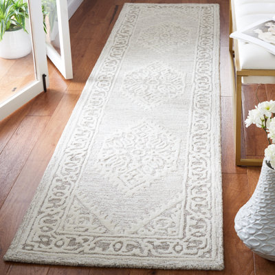 Tapis oriental ivoire / gris touffeté à la main Arcie Owen