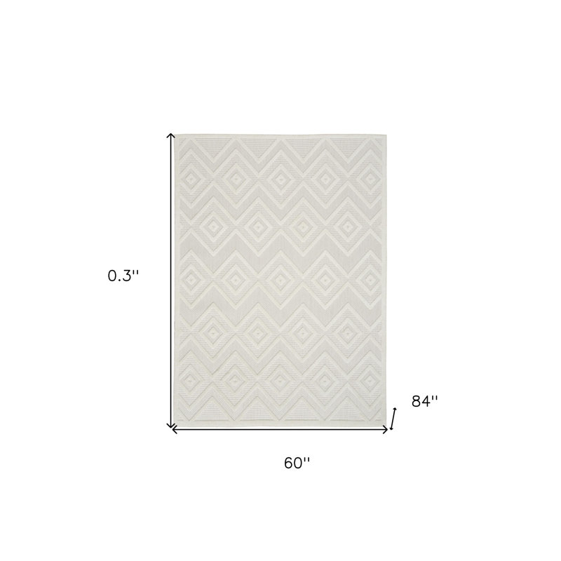 Tapis intérieur / extérieur ivoire et blanc 5 pi x 7 pi Argyle
