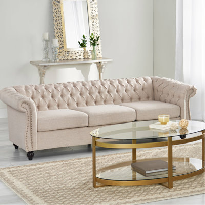 3 places avec revêtement beige et accoudoirs en tissu à volutes classiques