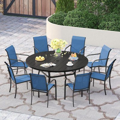 60" Patio dining set with Metal Round Dining Table and Stackable Armrest Dining Chairs by Red Barrel Studio