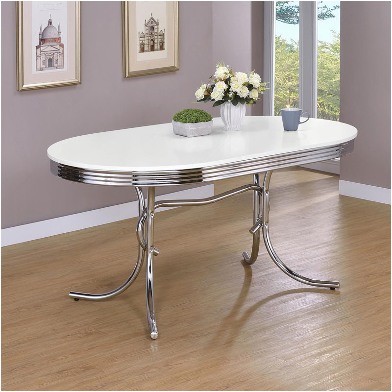 Table de salle à manger blanche et chrome ovale