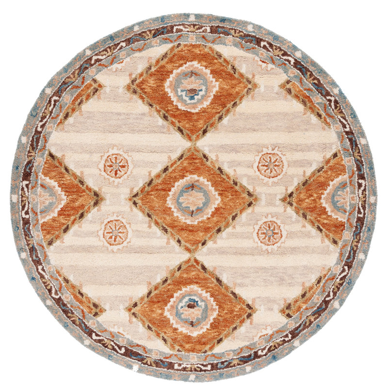 Arkadijus Southwestern Handmade Tufted Area Rug in Brown / Blue, Round 3'