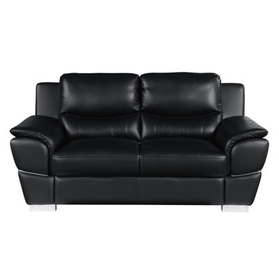 Cuir noir avec structure en bois franc séché au four ferme, coussin en mousse à 3 couches, pieds en acier inoxydable, structure intérieure en bois brésilien massif véritable en noir, pour une fabrication robuste.