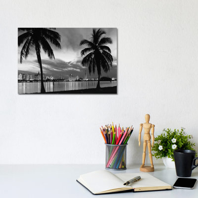 1950s Night Skyline View Across The Bay Two Palm Trees Silhouetted In Foreground Miami Florida USA - Wrapped Canvas Print