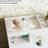 Wooden Baby Changing Table Dresser,Diaper Changing Table with Large Tabletop,4 Drawers, Open Storage Space & Side Shelves,Modern Storage Crib with Changing Table for Nurseries and Baby Rooms,White