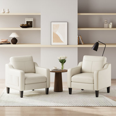 Fauteuil large en similicuir rembourré