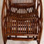 Belle et unique chaise berçante en rotin