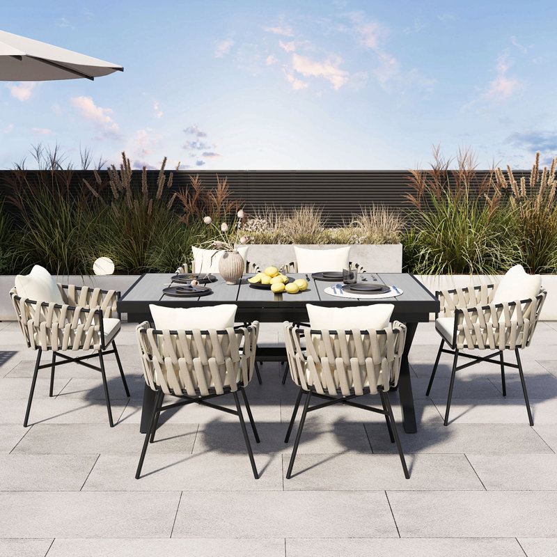 Discover Unmatched Flexibility In Alfresco Dining With Six Creatively Arranged Chairs Made Of Polyester Woven Tape And A Table That Expands From 62.9 To 82.6 Inches To Suit Any Occasion.