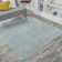 Arzel Solid Low-Pile Aqua Blue Rug