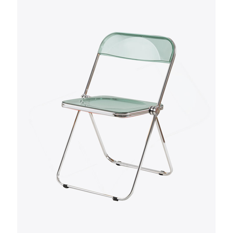 Chaise fantôme pliante transparente avec structure chromée, empilable et peu encombrante pour la vie moderne.
