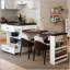 Îlot de cuisine extensible avec table coulissante, supports de rangement et prise de courant pour 2 à 6 personnes, finition grain de bois noyer