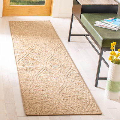 Tapis brun en jute noué à la main à motif géométrique Andressa