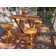 Tailbak 4 - Person Wood Patio Dining Set with Oval Table